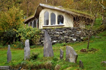 Cob Cottage with living roof at Cae Mabon, Wales
